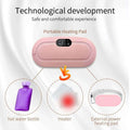 Portable heating pad with related items on a light gray background